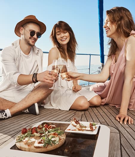 People enjoying food on a boat